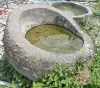 Product image 3 of the product “Riverstone basin, natural surface, polished inside. Dia approx 131-140cm Height 51-60cm ”